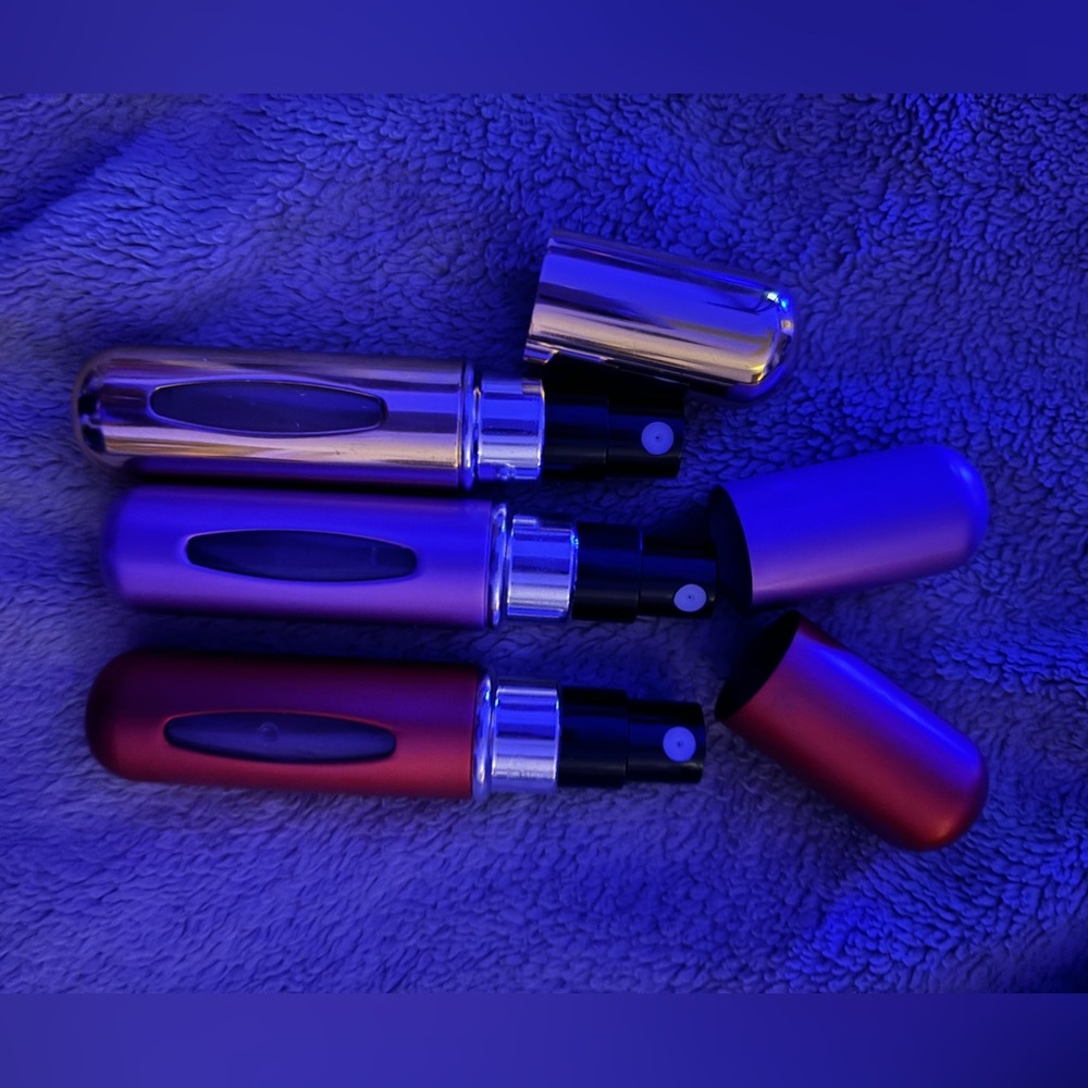 3 scents 3 refillable  mini perfume bottles
